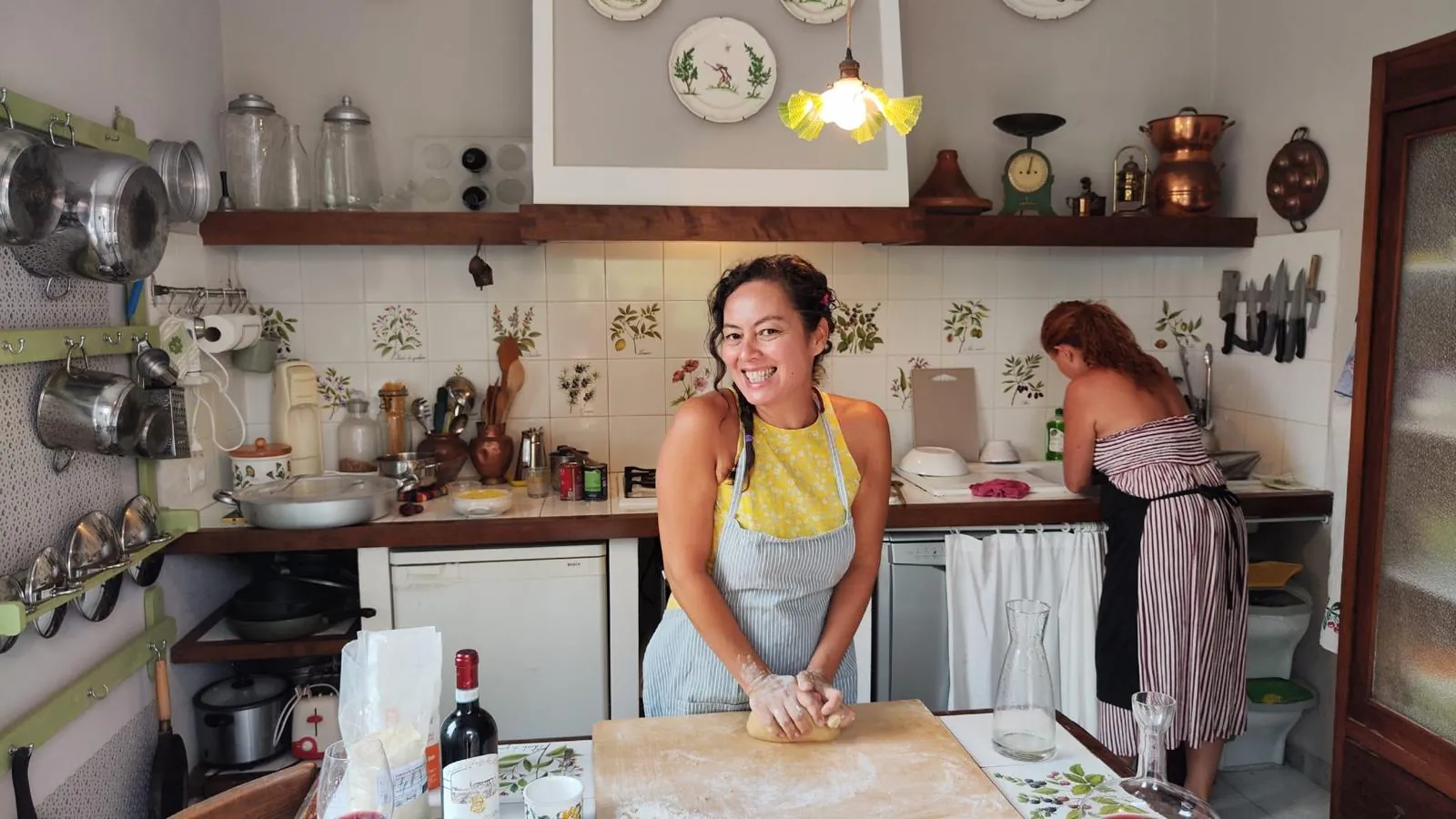 Ginny Flores in a home kitchen, kneading dough
